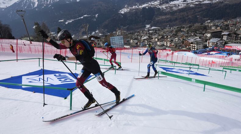 FILE - Athletes compete during the men's sprint race at the Ski Mountaineering World Cup event in Bormio, Italy, Saturday, Feb. 22, 2025. (AP Photo/Antonio Calanni, File)