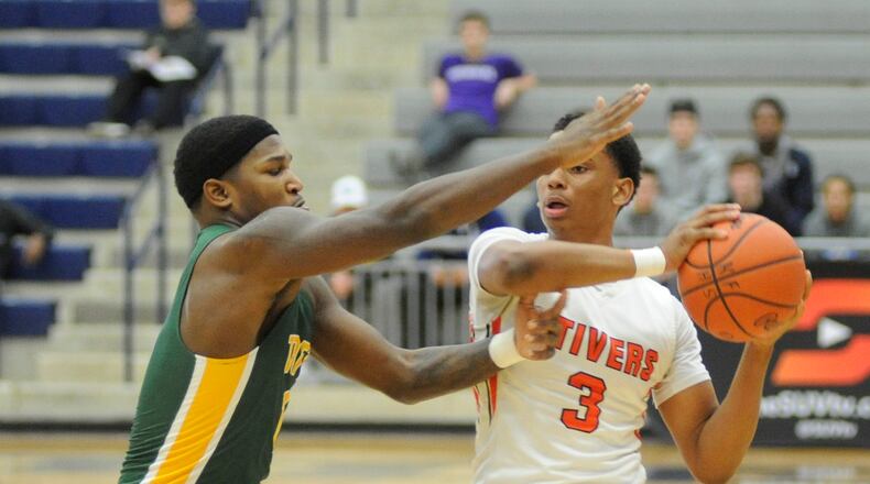 Trevon Ellis of Stivers (with ball) looks for an opening. Cin. Taft defeated Stivers 66-57 in Flyin’ to the Hoop at Trent Arena on Sunday, Jan. 20, 2019. MARC PENDLETON / STAFF
