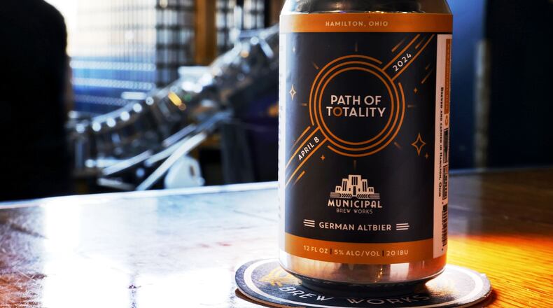 Municipal Brew Works spent the day Tuesday, March 19, 2024 canning several beers including their new Path of Totality German Altbier brewed to celebrate the upcoming solar eclipse. NICK GRAHAM/STAFF
