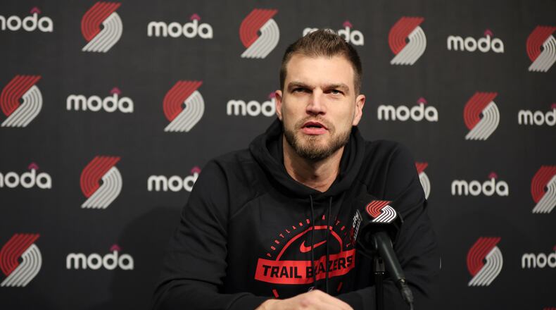 Portland Trail Blazers acting head coach Tiago Splitter speaks during a press conference before an NBA basketball game against the Golden State Warriors, Friday, Oct. 24, 2025, in Portland, Ore. (AP Photo/Amanda Loman)