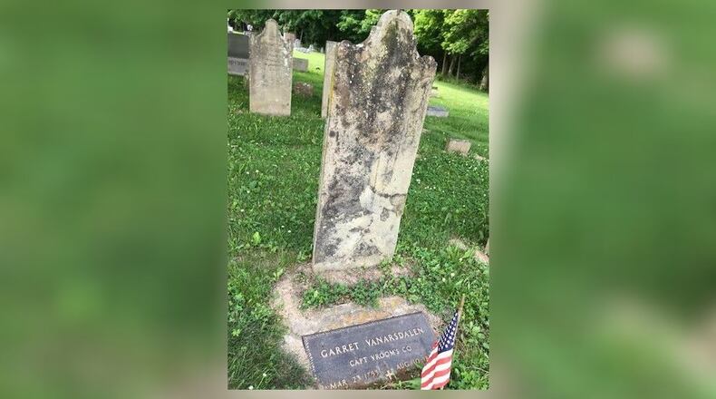The effects of weather on early gravestones renders many of them unreadable, such as this one for a man known variously as Garret Vanarsdalen and Garrett Van Ausdall buried in the Springdale Cemetery on Springfield Road in Reily. Many such graves have had bronze plaques attached to them to identify who is buried there. CONTRIBUTED