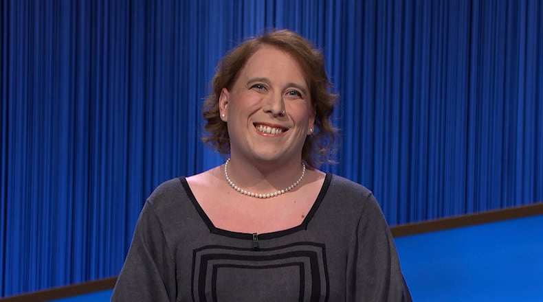 This image provided by Jeopardy Productions, Inc. shows game show champion Amy Schneider on the set of "Jeopardy!" Schneider is the first trans person to qualify for the show's Tournament of Champions. (Jeopardy Productions, Inc. via AP)