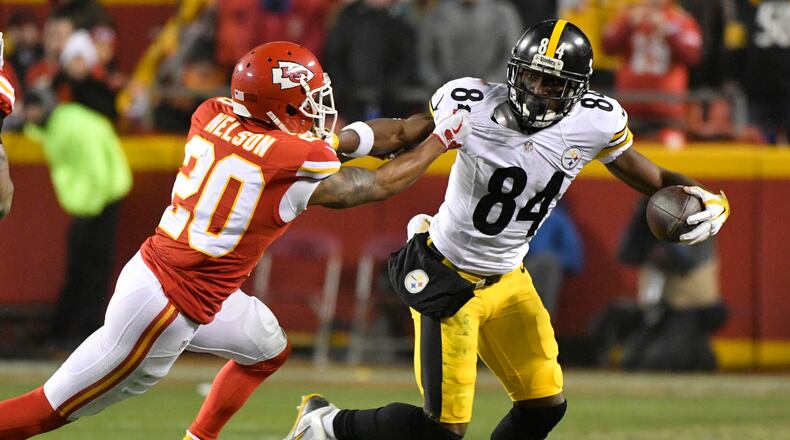 Pittsburgh Steelers wide receiver Antonio Brown (84) breaks a tackle by Kansas City Chiefs cornerback Steven Nelson (20) after making a reception during the first half of an NFL divisional playoff football game Sunday, Jan. 15, 2017, in Kansas City, Mo. (AP Photo/Ed Zurga)