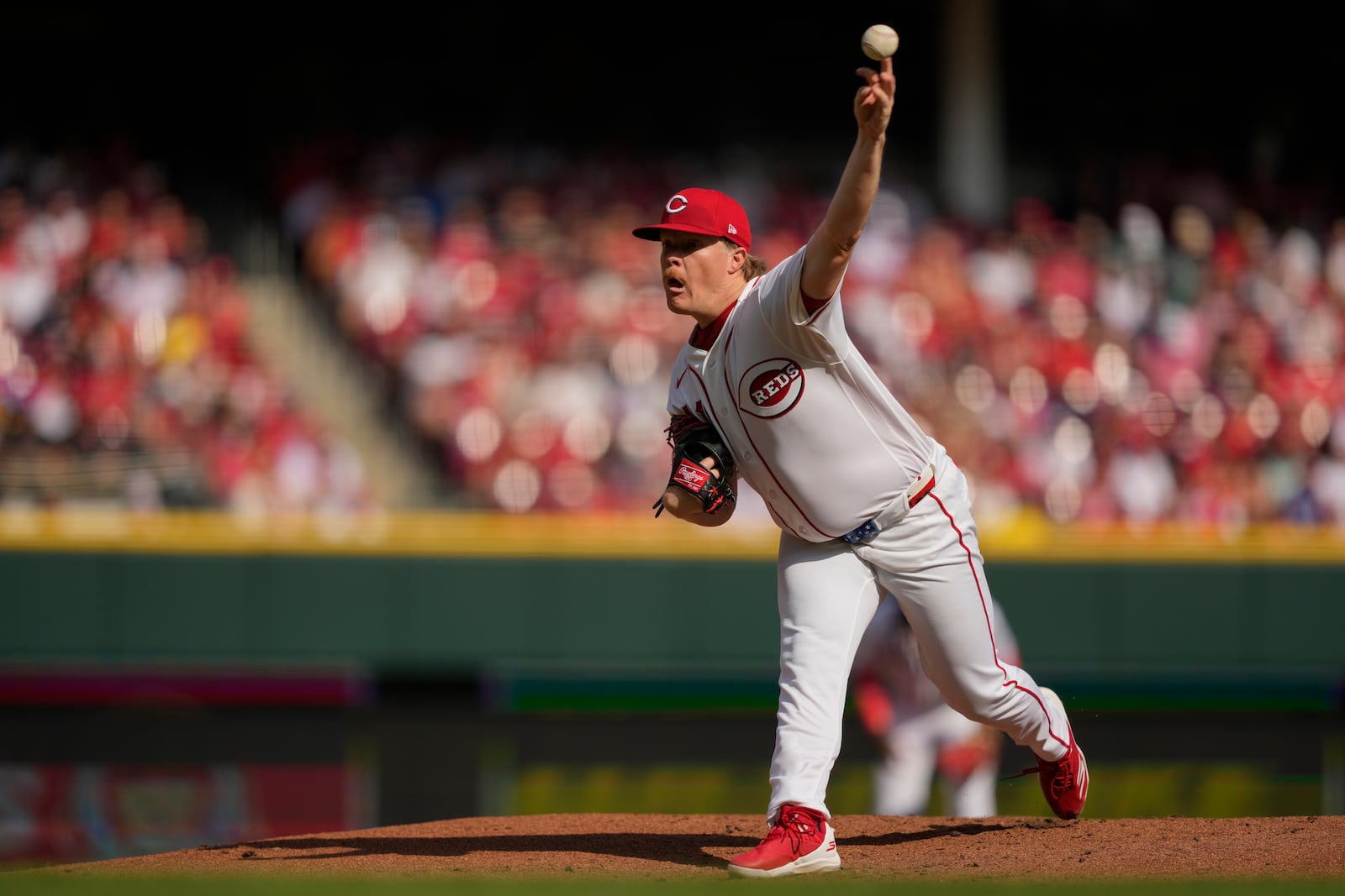 Cincinnati Reds pitcher Andrew Abbott throws during the first inning of an opening-day baseball game against the Boston Red Sox in Cincinnati, Thursday, March 26, 2026. (AP Photo/Carolyn Kaster)