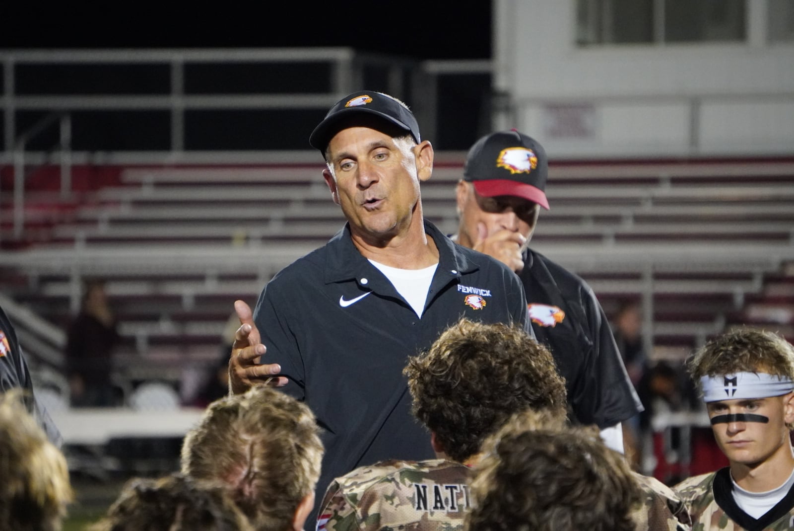 Fenwick football coach Fred Cranford talks with his team on Thursday night. CHRIS VOGT / CONTRIBUTED