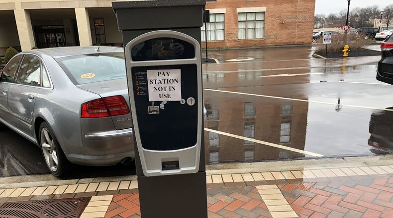 Hamilton parking kiosks were to be activated to begin collecting money in March of 2020, but that was delayed by the Covid-19 pandemic. The kiosks will be activated July 12. In the meantime, parkers are receiving warning slips about the need to pay in the near future. MIKE RUTLEDGE/STAFF