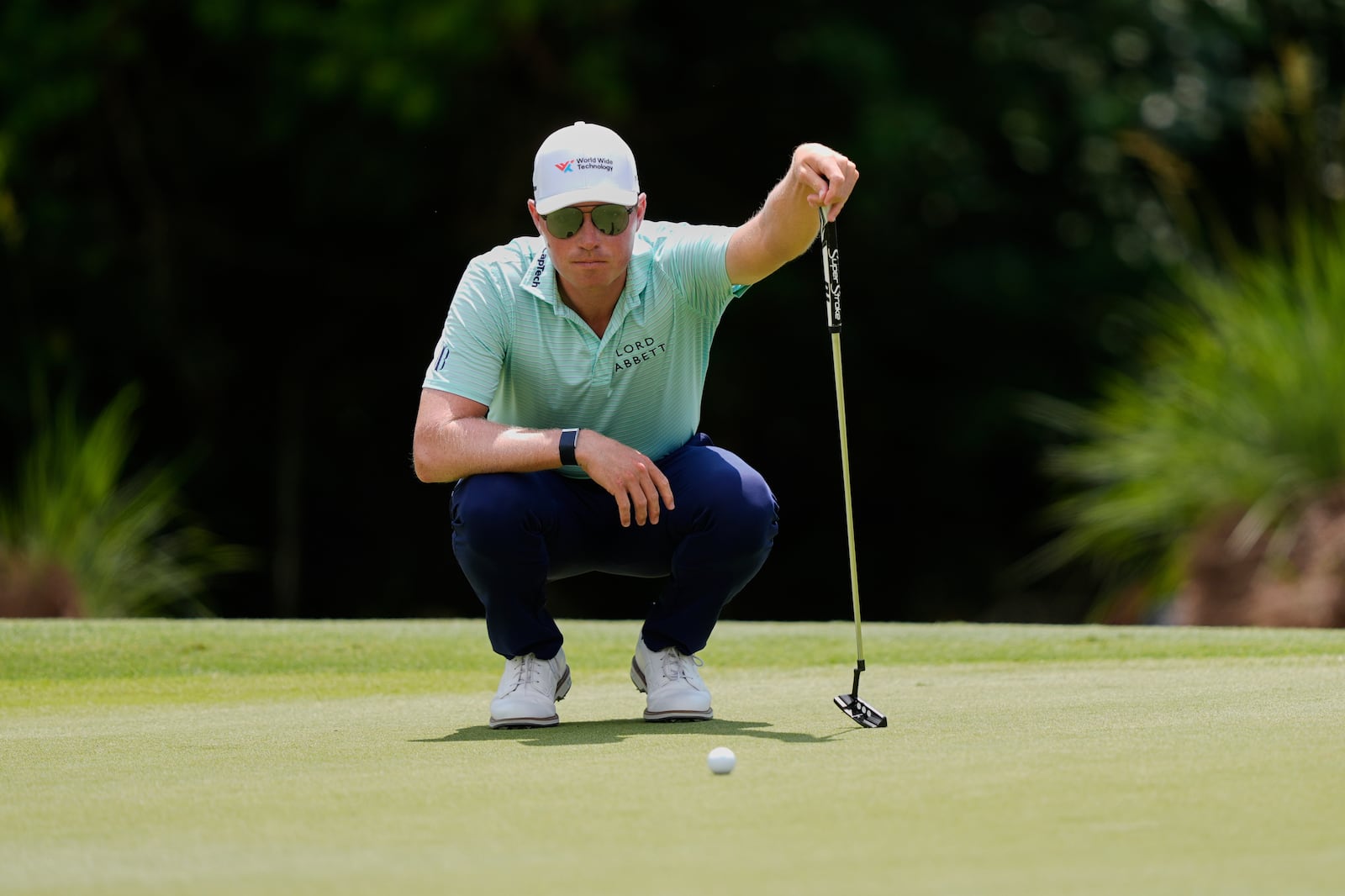 Ben Griffin lines up a shot on the 4th green during the final round of the PGA Zurich Classic golf tournament at TPC Louisiana in Avondale, La., Sunday, April 27, 2025. (AP Photo/Gerald Herbert)