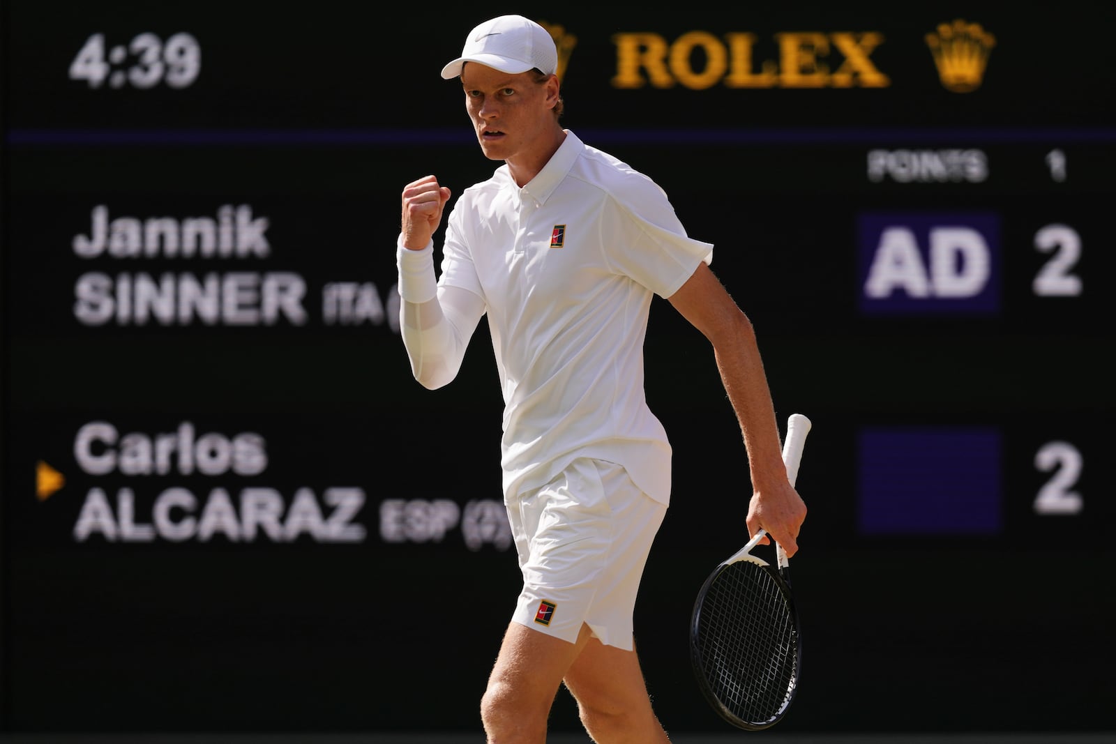 Jannik Sinner of Italy reacts during the men's singles final match against Carlos Alcaraz of Spain at the Wimbledon Tennis Championships in London, Sunday, July 13, 2025.(AP Photo/Kirsty Wigglesworth)