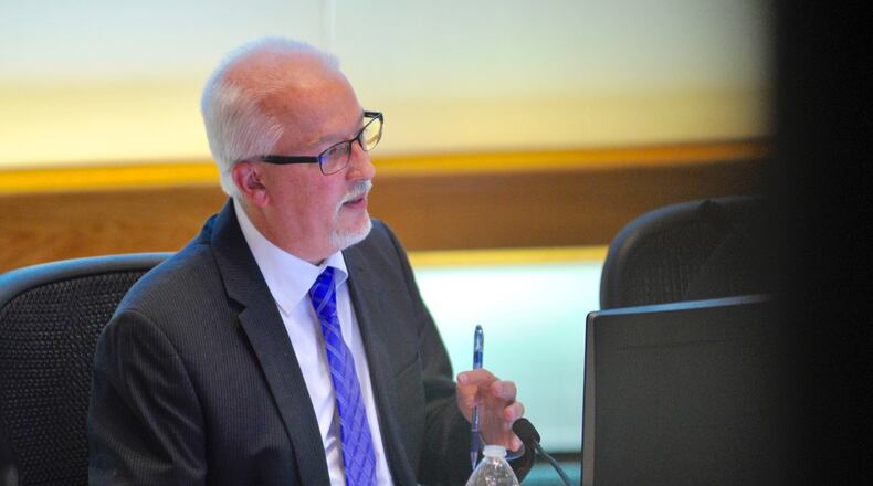 Doug Adkins, Middletown's former city manager, has filed a civil lawsuit against the city claiming age, gender and race discrimination. NICK GRAHAM / STAFF