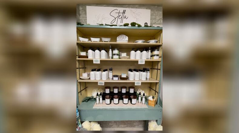Petals & Wicks on Main Street in Hamilton has re-branded its women’s line to honor Stella Weiler Taylor, a Hamiltonian of yesteryear. It's called Stella Beloved. MICHAEL D. PITMAN/STAFF