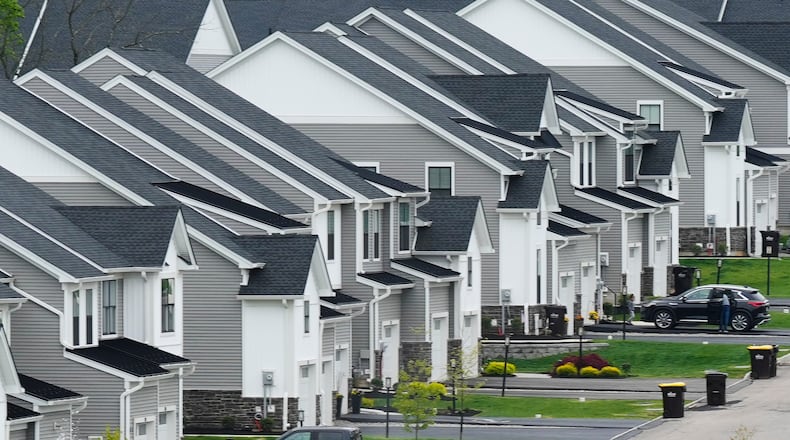 FILE - Newly developed homes sit in a row in Eagleville, Pa., April 28, 2023. (AP Photo/Matt Rourke, File)