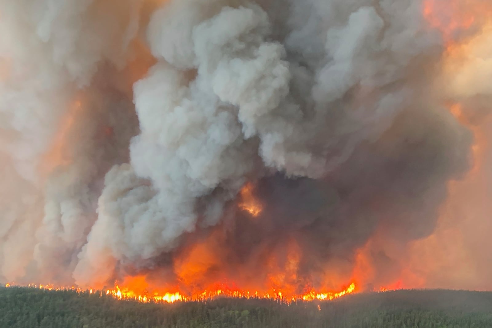 This photo provided by the Manitoba government shows wildfires in Sherridon, Manitoba, Canada on Tuesday, May 27, 2025. (Manitoba government via AP)