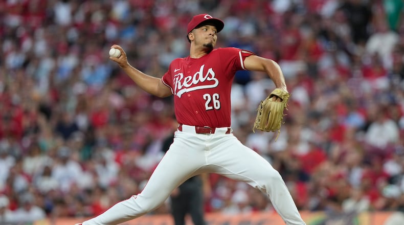 Cincinnati Reds pitcher Chase Burns throws during the first inning of a baseball game against the Los Angeles Dodgers, Monday, July 28, 2025, in Cincinnati. (AP Photo/Carolyn Kaster)