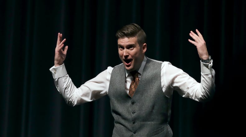 White Nationalist Richard Spencer tries to get students to shout louder as they clash during a speech Thursday, Oct. 19, 2017, at the University of Florida in Gainesville. (AP Photo/Chris O’Meara)