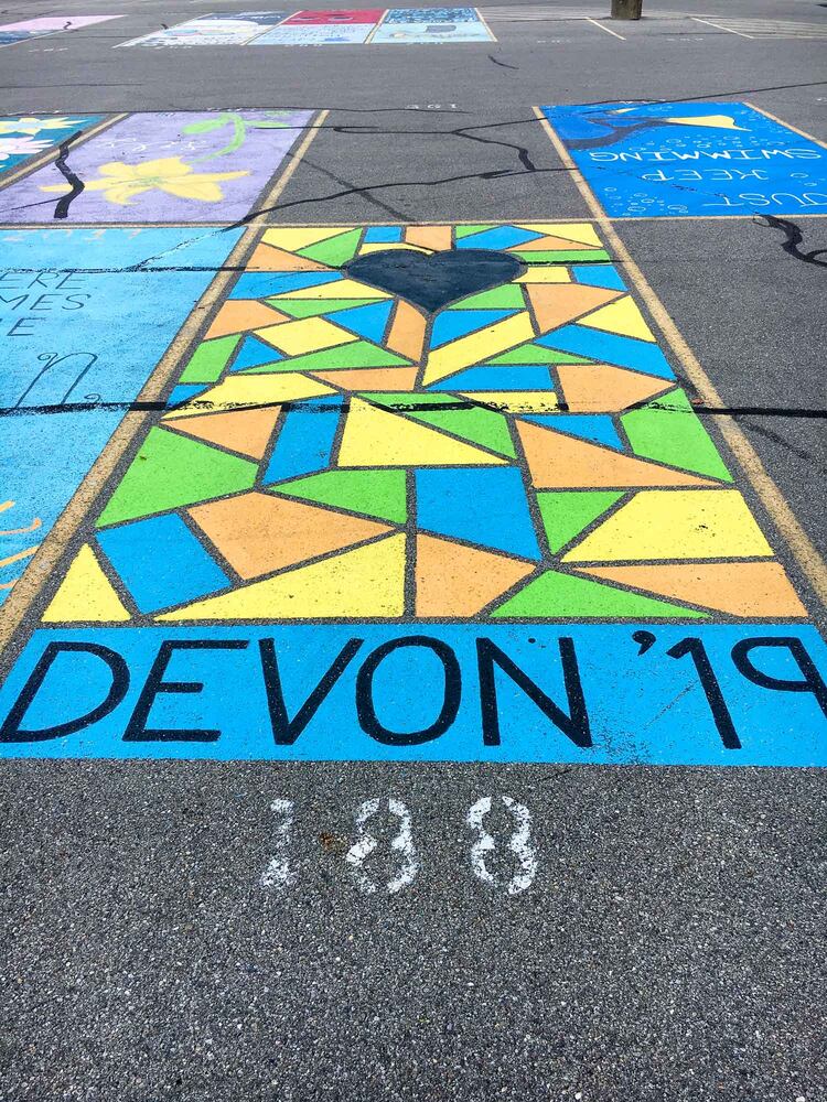 PHOTOS Lakota East seniors paint parking spots
