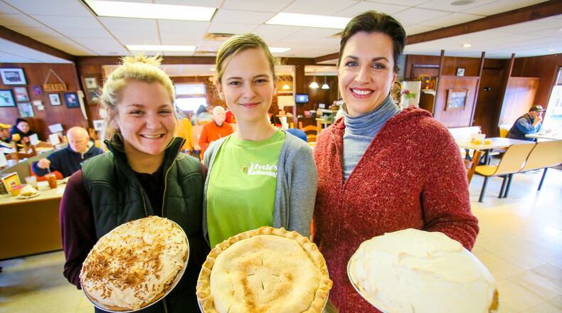 Tarin Lauer, Audrey Amburgy, and co-owner Amy Hyde-Klaiber stand with coconut, apple and banana cream pies at Hyde’s Restaurant in Hamilton on Pi Day, Tuesday, Mar. 14, 2017. Hyde’s closed for renovations on June 2, 2019. It’s slated to reopen at 6:30 a.m. June 10. GREG LYNCH / STAFF