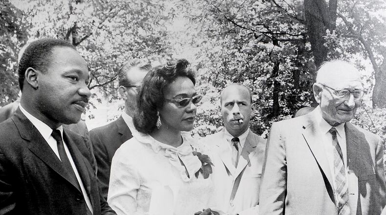 Dr. Martin Luther King, Jr. with his wife Coretta Scott King at Antioch College in Yellow Springs in 1965. DAYTON DAILY NEWS ARCHIVE