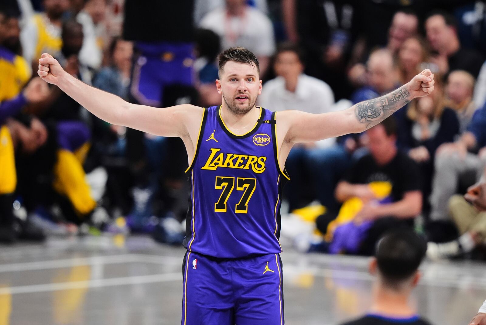 Los Angeles Lakers' Luka Doncic gestures to an official in the second half of an NBA basketball game against the Dallas Mavericks in Dallas, Wednesday, April 9, 2025. (AP Photo/LM Otero)