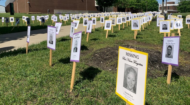 Posters of Ohio's missing adults and children assembled on the lawn of Wright State University, Saturday May 17, 2025 in recognition of MIssing Persons Day. LONDON BISHOP/STAFF