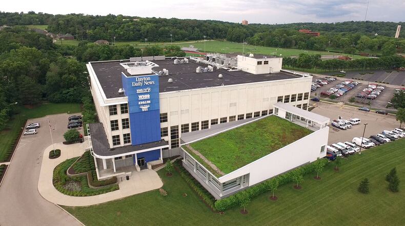 The Cox Media Group Ohio building is a former NCR building.   NCR is moving into its second headquarters building located in Atlanta since leaving Dayton in 2009.   TY GREENLEES / STAFF