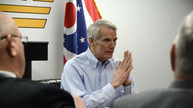 U.S. Sen. Rob Portman, R-Cincinnati, talks to Butler County leaders on Friday afternoon, Jan. 4, 2019, at the Butler County Sheriff’s Office about the opioid crisis facing the county and country. Before the discussion, Portman toured the jail and spoke with women benefiting from the 21st Century CURES Act, legislation he championed in Washington, D.C. MICHAEL D. PITMAN/STAFF