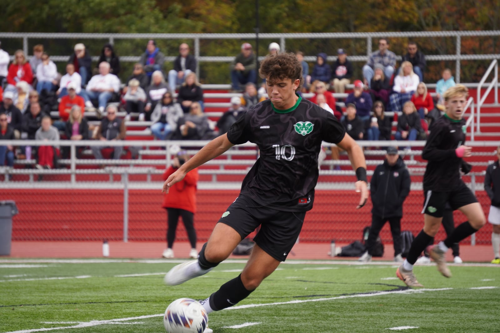 Badin’s Joe Jung (10) sends a pass up field against Tippecanoe during a Division III district final on Saturday at Trotwood-Madison. CHRIS VOGT / CONTRIBUTED