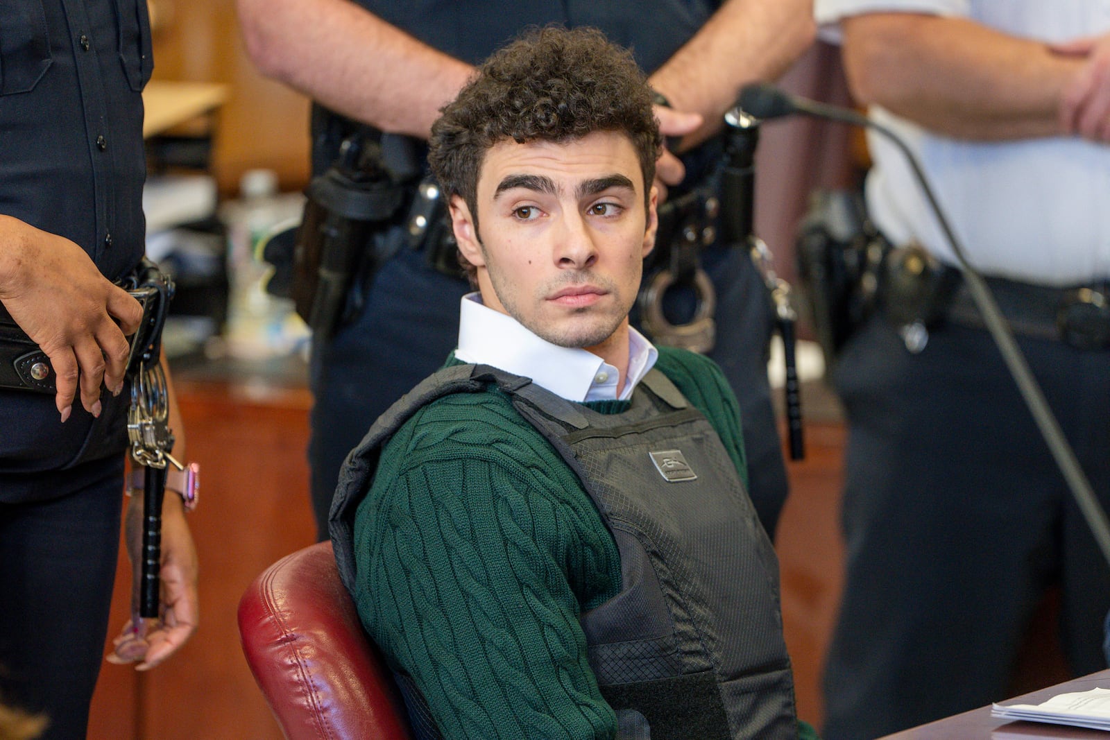 FILE - Luigi Mangione , accused of fatally shooting the UnitedHealthcare CEO Brian Thompson in New York City and leading authorities on a five-day search is scheduled, appears in court for a hearing, Friday, Feb. 21, 2025, in New York. (Steven Hirsch/New York Post via AP, Pool, File)
