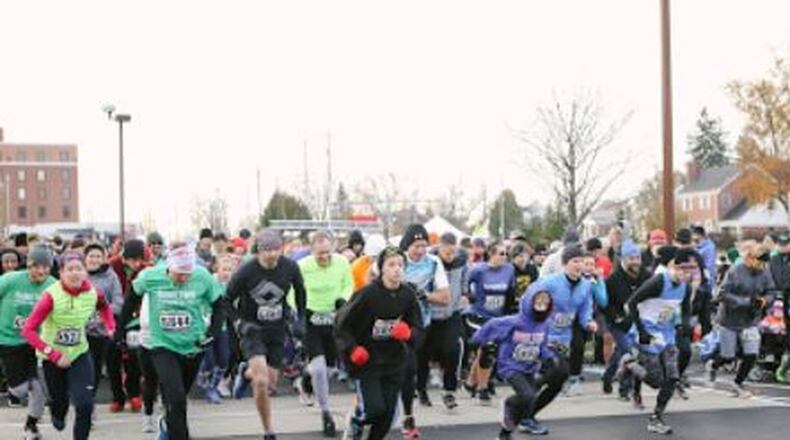 The Thanksgiving 5K in Hamilton is a growing local tradition that started a few years ago with 30 runners. Now, hundreds participate in the event that raises funds for a ministry that helps teen mothers and their children.