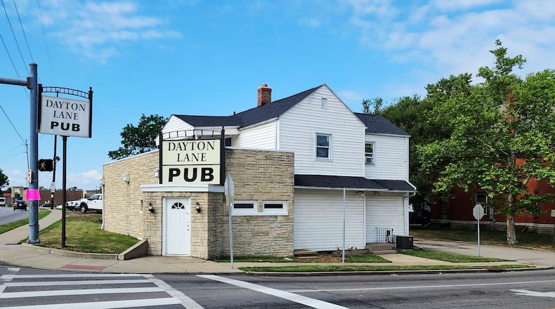 A man was shot and killed outside Dayton Lane Pub Sunday night in Hamilton. NICK GRAHAM/STAFF