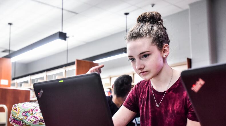 Devon Brown works on a Chromebook in the media center innovation hub Wednesday, April 3, 2019 at Lakota East High School in Liberty Township. NICK GRAHAM/STAFF