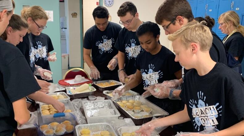 Royalmont Academy was named the Duke Energy School of the Week for efforts to collect winter essentials for the homeless in downtown Cincinnati. CONTRIBUTED