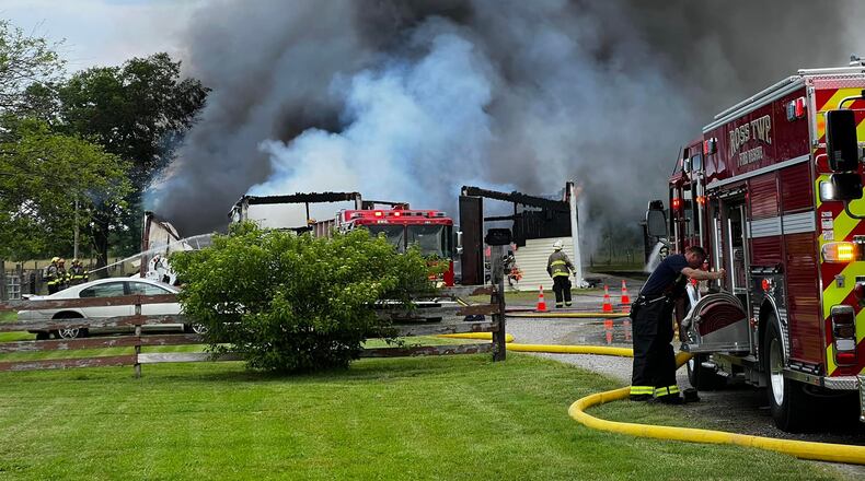 Sheriff's deputies and area fire officials respond to a structure fire at 2100 Stahlheber Road in Hamilton around 11 a.m. Monday, June 6, 2022. CONTRIBUTED/BUTLER CO. SHERIFF
