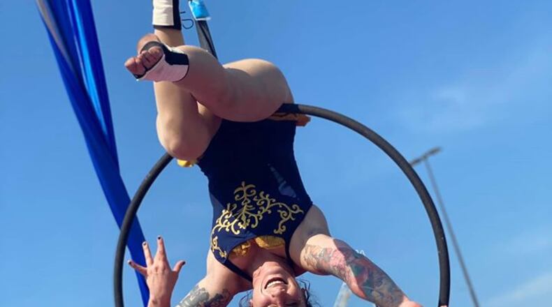 Looking at the world upside-down this aerialist from the Cincinnati Circus performs high above the ground. The troupe will be in Oxford Oct. 29 as a Halloween treat for the community. CONTRIBUTED