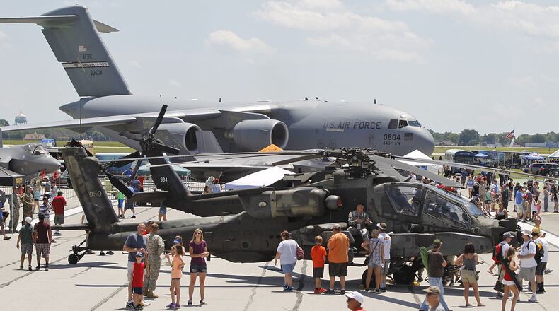 Military aircraft fill the ramp at the Vectren Dayton Air Show. TY GREENLEES / STAFF FILE PHOTO
