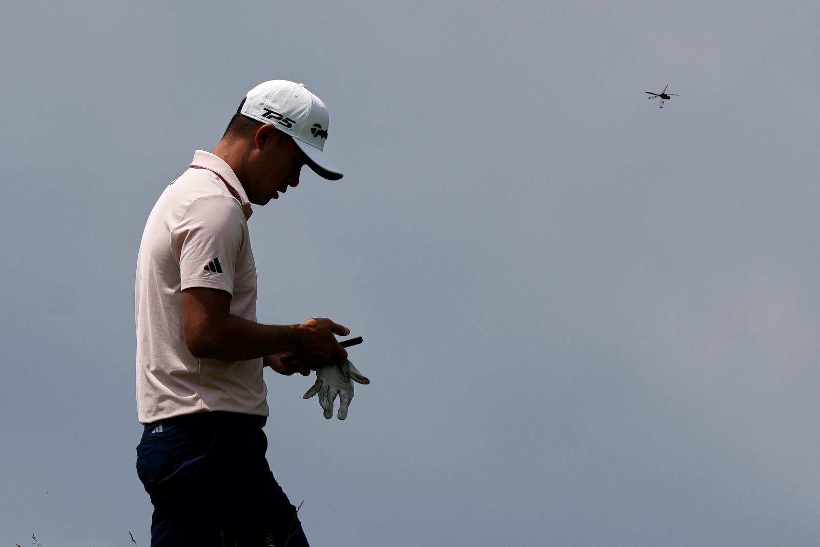 Collin Morikawa walks to the 17th tee during a practice round ahead of the U.S. Open golf tournament at Oakmont Country Club Tuesday, June 10, 2025, in Oakmont, Pa. (AP Photo/Charlie Riedel)