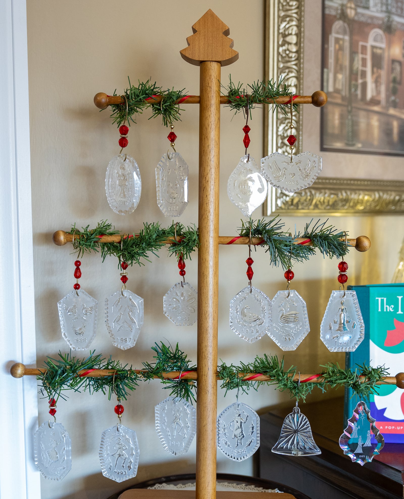 A Waterford "12 Days of Christmas" collection is part of the vast amount of holiday decorations in the home of Anita and Doug Wales in Miami Twp. BRYANT BILLING/STAFF