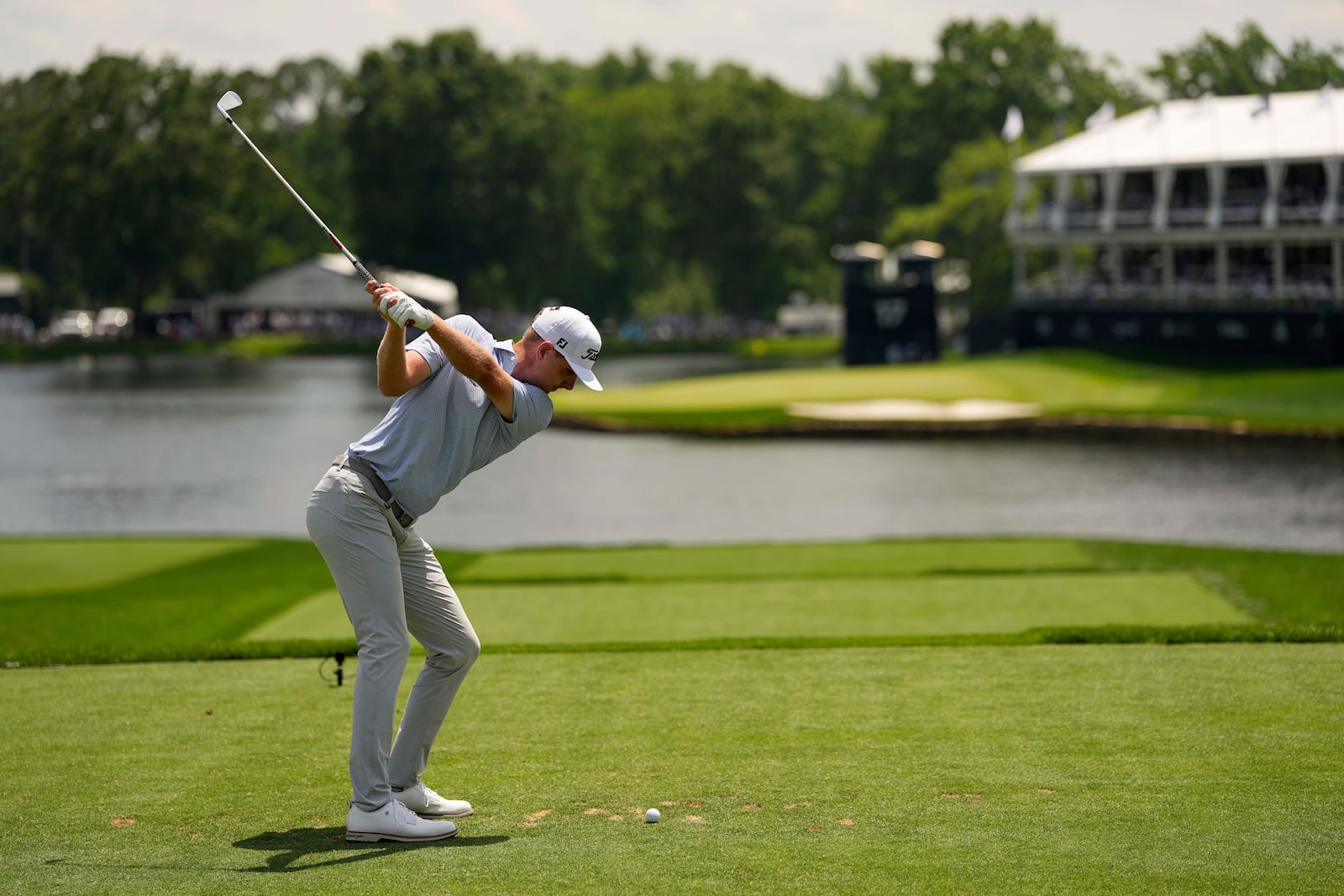 Ryan Gerard hits his tee shot on the 17th hole during the first round of the PGA Championship golf tournament at the Quail Hollow Club, Thursday, May 15, 2025, in Charlotte, N.C. (AP Photo/David J. Phillip)