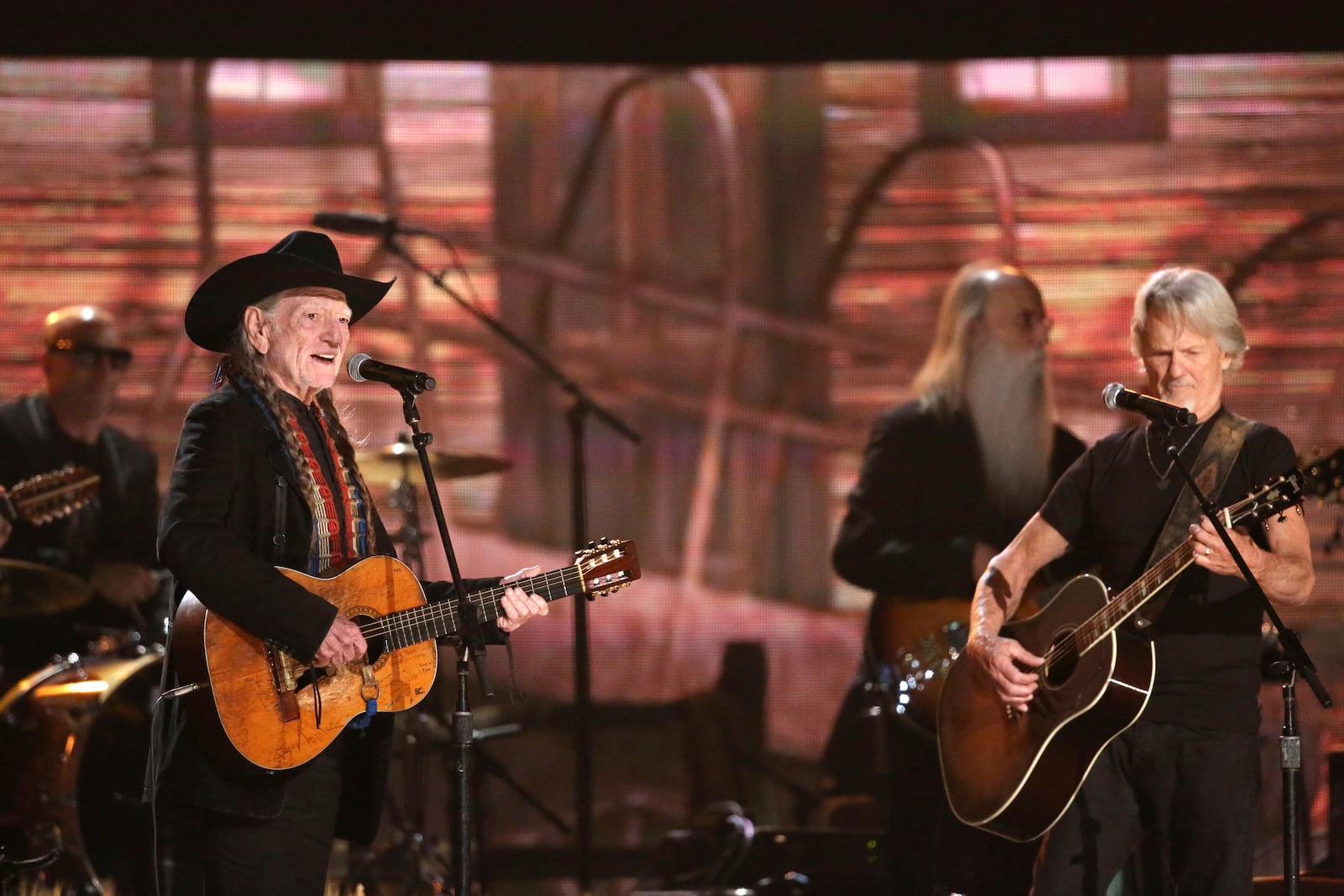 FILE - Willie Nelson, left, and Kris Kristofferson perform on stage at the 56th annual Grammy Awards on Jan. 26, 2014, in Los Angeles. (Photo by Matt Sayles/Invision/AP, File)