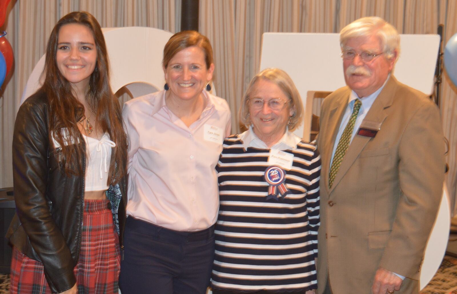 Jim Robinson, right, was honored with the Greater Oxford Area Community Foundation’s Paving the Way Award and joining him for the evening were members of his family, from right, wife Pam, daughter Tara Jones and granddaughter Marin Jones. CONTRIBUTED/BOB RATTERMAN