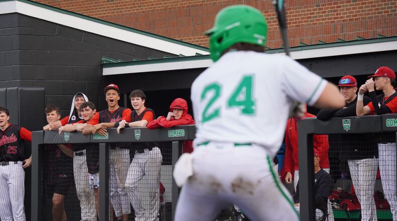 Lakota West players cheer on their teammates during their game against Mason on Friday. CHRIS VOGT/CONTRIBUTED PHOTO