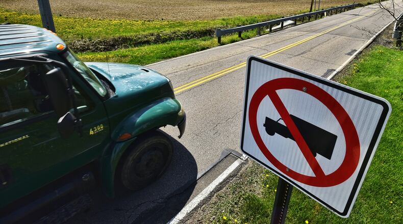 Residents on Todhunter Road in Monroe have been upset by the number of trucks traveling on their road. They said there are "no truck" signs on the road are disobeyed by drivers. NICK GRAHAM/STAFF