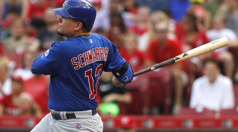 The Cubs’ Kyle Schwarber singles in the first inning against the Reds on Monday, July 20, 2015, at Great American Ball Park in Cincinnati. DAVID JABLONSKI/STAFF
