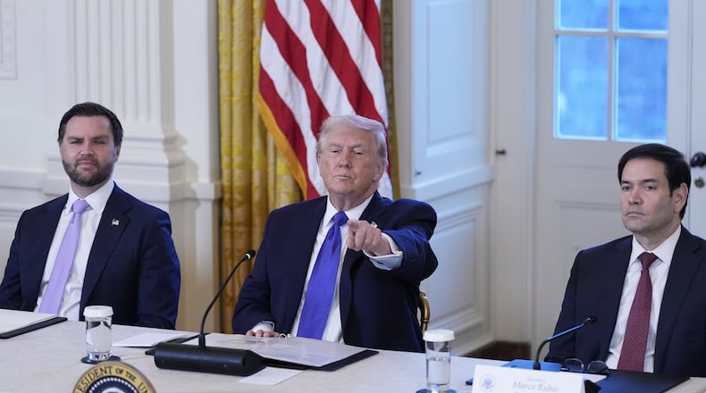 President Donald Trump chooses a reporter to ask a question with Vice President JD Vance, left, and Sec. of State Marco Rubio, right, during a meeting with oil executives in the East Room of the White House, Friday, Jan. 9, 2026, in Washington. (AP Photo/Alex Brandon)