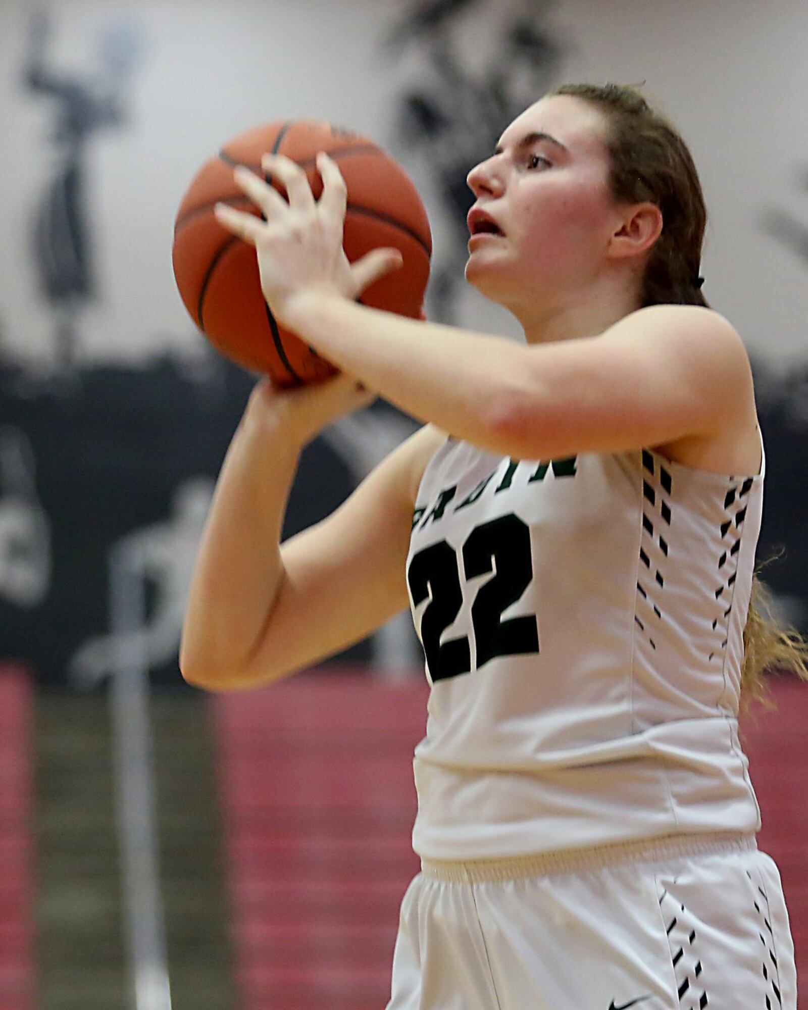 Badin forward Lauren Krause is about to sink one of her two 3-pointers during Saturday afternoon’s Division III sectional final against Madeira at Fairfield Arena. CONTRIBUTED PHOTO BY E.L. HUBBARD