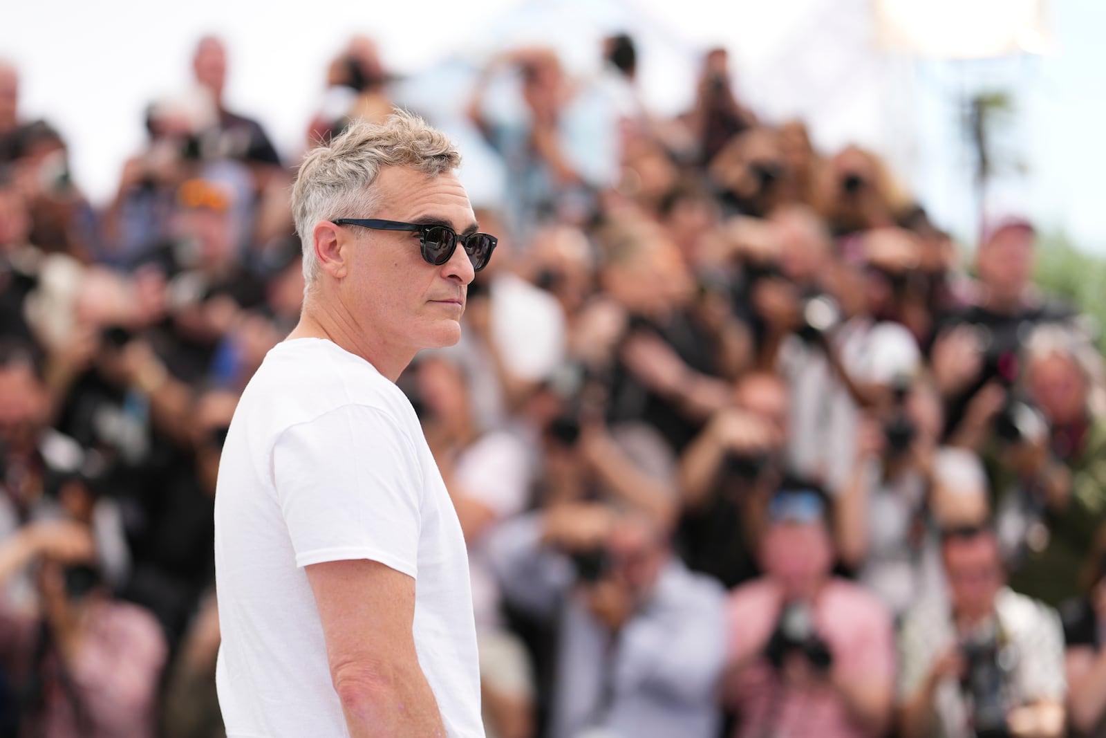 Joaquin Phoenix poses for photographers at the photo call for the film 'Eddington' at the 78th international film festival, Cannes, southern France, Saturday, May 17, 2025. (Photo by Scott A Garfitt/Invision/AP)