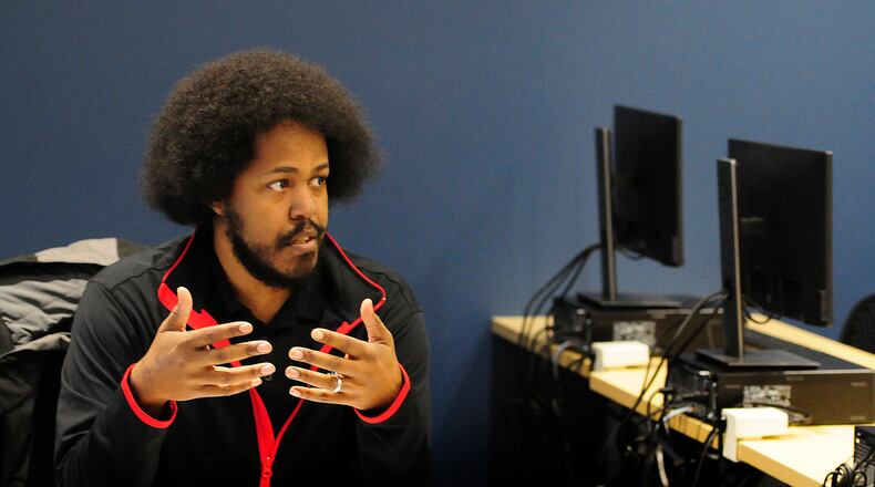 Sinclair Community College instructor Liban Knight teaches an Information Technology class Wednesday, Jan. 24, 2024. MARSHALL GORBY\STAFF