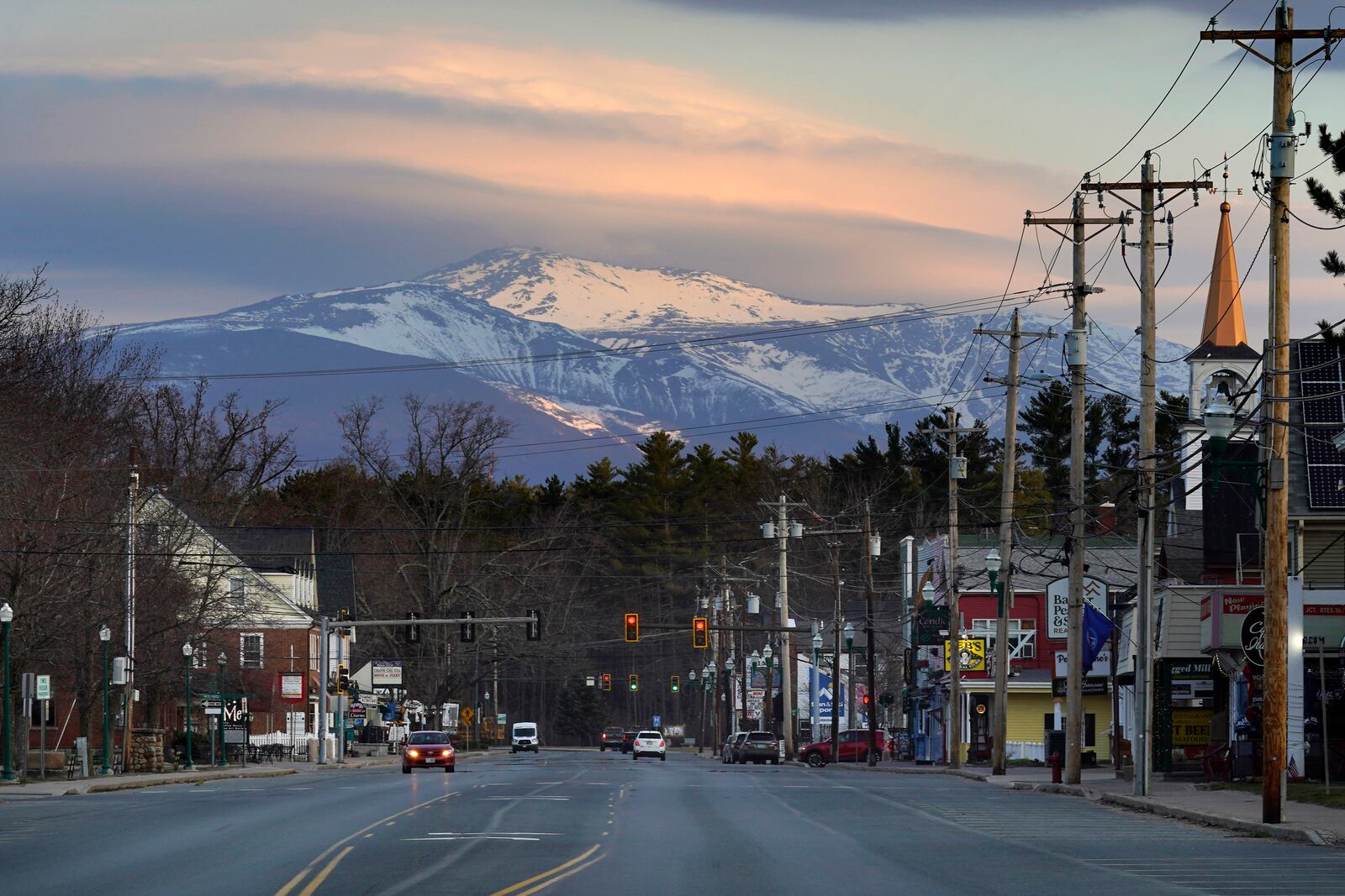FILE - Mount Washington dominates the scene in this view of the business district in the village of North Conway, N.H., Thursday, April 13, 2023. (AP Photo/Robert F. Bukaty, File)