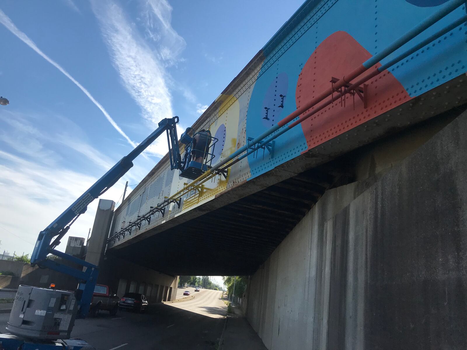 Local artists Jes McMillan is leading a group painting a train overpass near the intersection of  Keowee and First streets for the East Dayton Arts District. 
Vincent Detrick, Ileana Del Campo-Gray,  Kate Edmondson and Amy Dallis are also helping with the project.