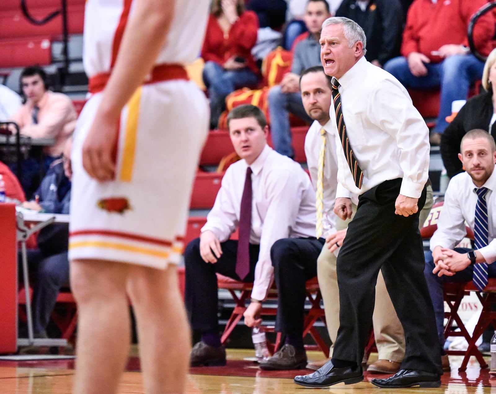 Fenwick coach Pat Kreke makes a forceful point during Tuesday night’s game against visiting Edgewood. NICK GRAHAM/STAFF