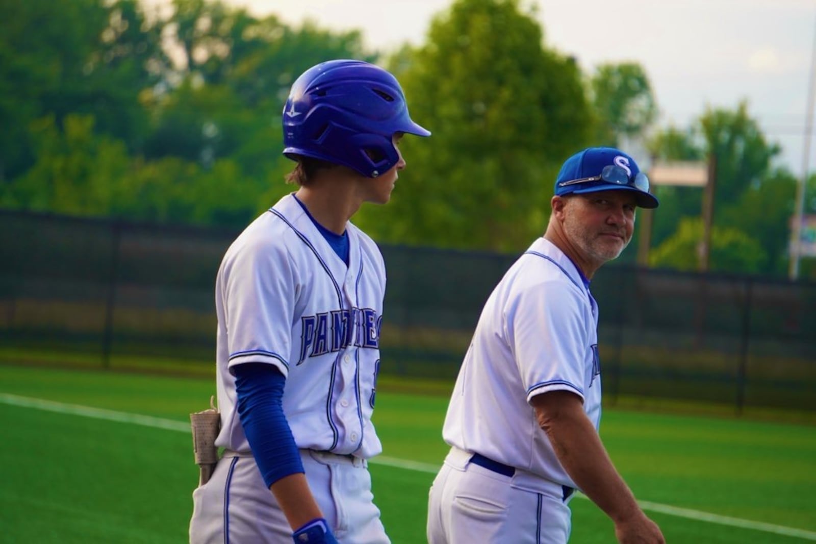 Springboro coach Mark Pelfrey gets done chatting with Colten Muhlenkamp before he heads to the plate during a Division I state semifinal against Perrysburg on Saturday at Thurman Munson Memorial Stadium in Canton. CHRIS VOGT / CONTRIBUTED